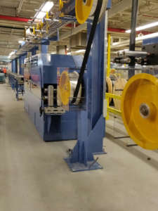 Automations of extrusion line for flat iron cables